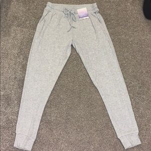 stars above light grey joggers size small